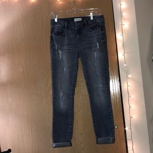 Distressed trendy jeans